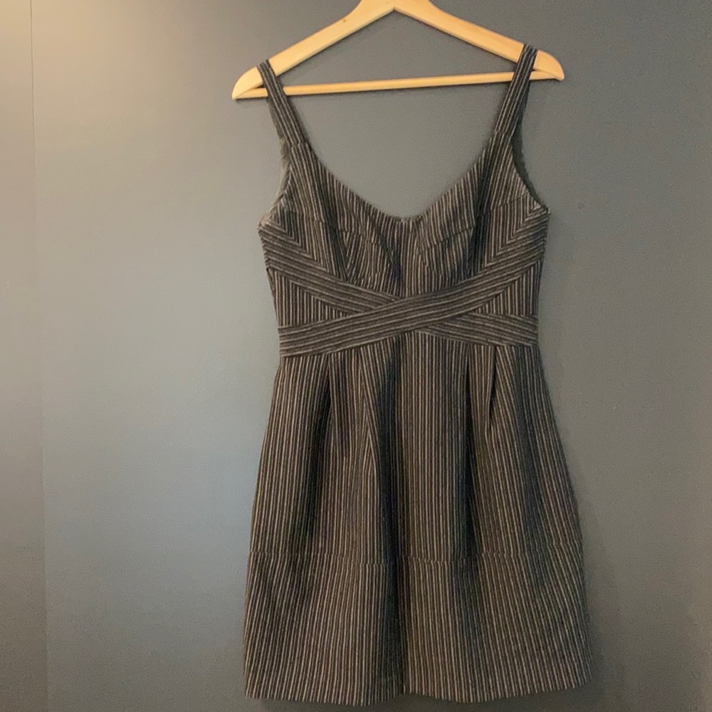 Nannette Lepore size 2 scoop neck pin stripped dress with pockets.